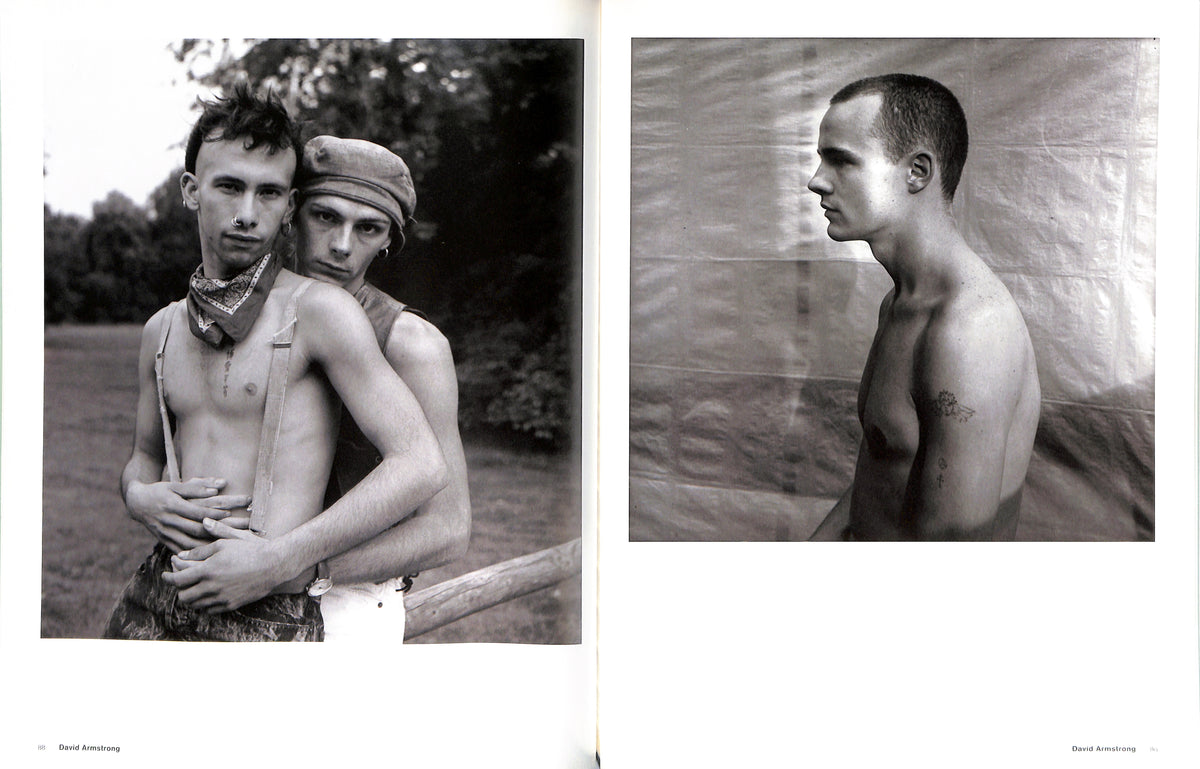 Internal shot - NAN GOLDIN, DAVID ARMSTRONG, MARK MORRISROE, JACK PIERSON, PHILIP-LORCA diCORCIA / Emotions & Relations. Black and white photo collage of two men, one embracing the other outdoors and the other standing against a textured wall.