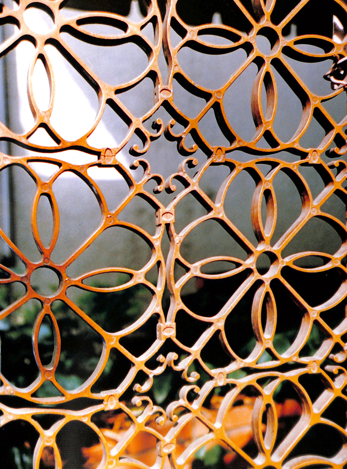 Interior page of HIROMIX / Hikari Decorative metal screen with intricate floral patterns