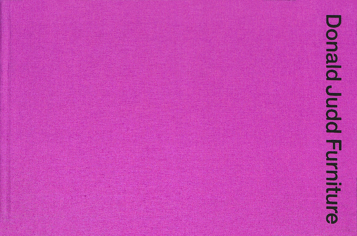 Purple book cover with 'Donald Judd Furniture' text on a purple background