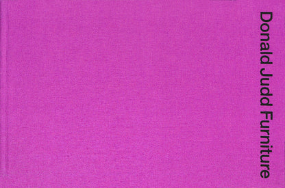 Purple book cover with 'Donald Judd Furniture' text on a purple background