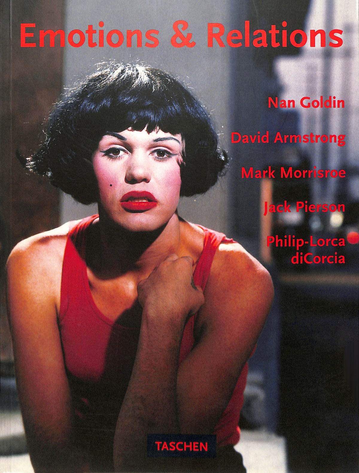Cover shot - Book cover of 'Emotions & Relations' featuring a woman with a red top and black hair.